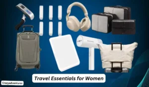 A collection of travel essentials for women is displayed against a dark blue background. Items include a luggage scale, over-ear headphones, packing cubes, an expandable suitcase, a travel towel, an electronic massager, a portable steamer, and a versatile tote bag. The text "Travel Essentials for Women" is at the bottom center.