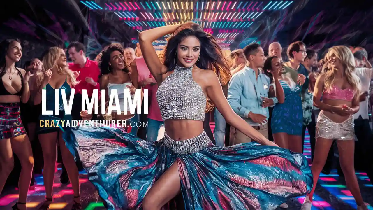 15 Best Things to do in Miami Florida for Couples at Night 16 A woman in a sparkling crop top and flowing skirt dances energetically in a vibrant nightclub filled with colorful lights. People around her are enjoying the lively atmosphere. The text "LIV MIAMI" and "CrazyAdventurer.com" are prominently displayed on the left side.