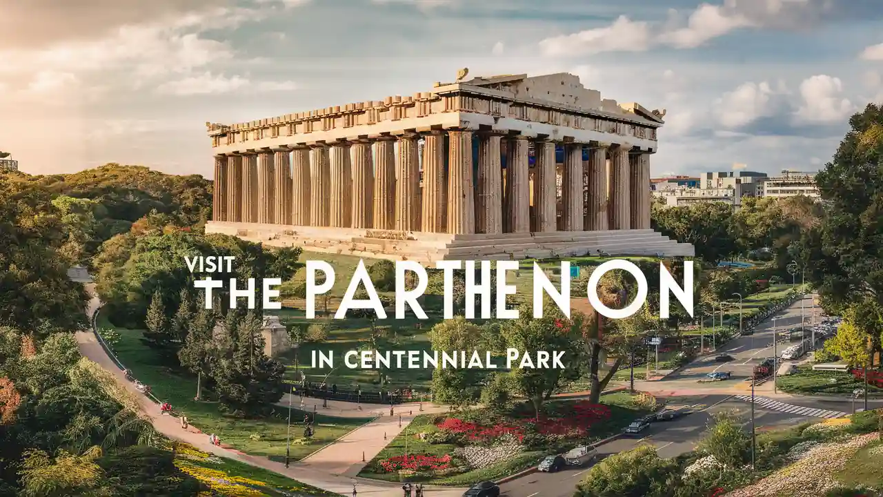 Top 15 Romantic Things to do in Nashville Tennessee for Couples 13 An image of the Parthenon replica located in Centennial Park, Nashville. The structure is surrounded by lush greenery, pathways, and colorful gardens. Text overlay reads "Visit the Parthenon in Centennial Park.