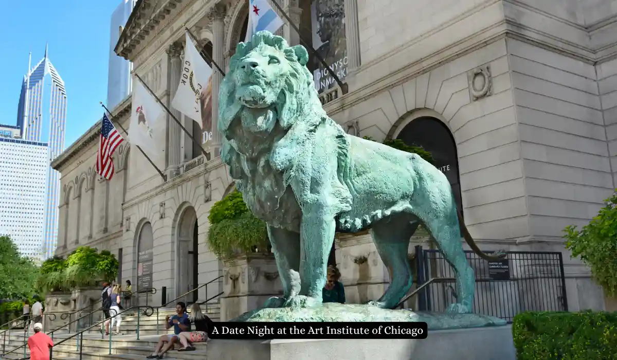 Top 15 Romantic Things to Do in Chicago for Couples 9 The image shows a bronze lion statue in front of the Art Institute of Chicago. The building has classical architecture with arched windows. There are people sitting on the steps, and banners hang from the facade.
