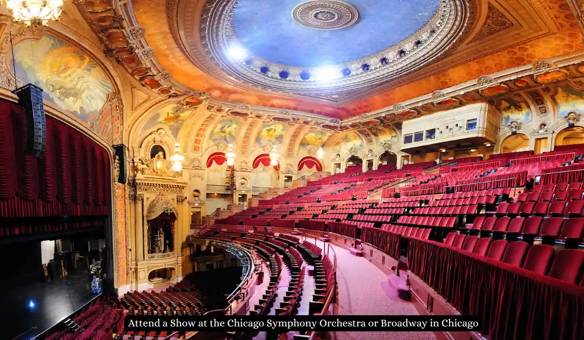 Top 15 Romantic Things to Do in Chicago for Couples 12 Ornate theater interior with a grand, domed ceiling, intricate architectural details, and rows of red seats. Warm lighting enhances the opulent design. A stage is visible on the left side. Text at the bottom mentions events in Chicago.