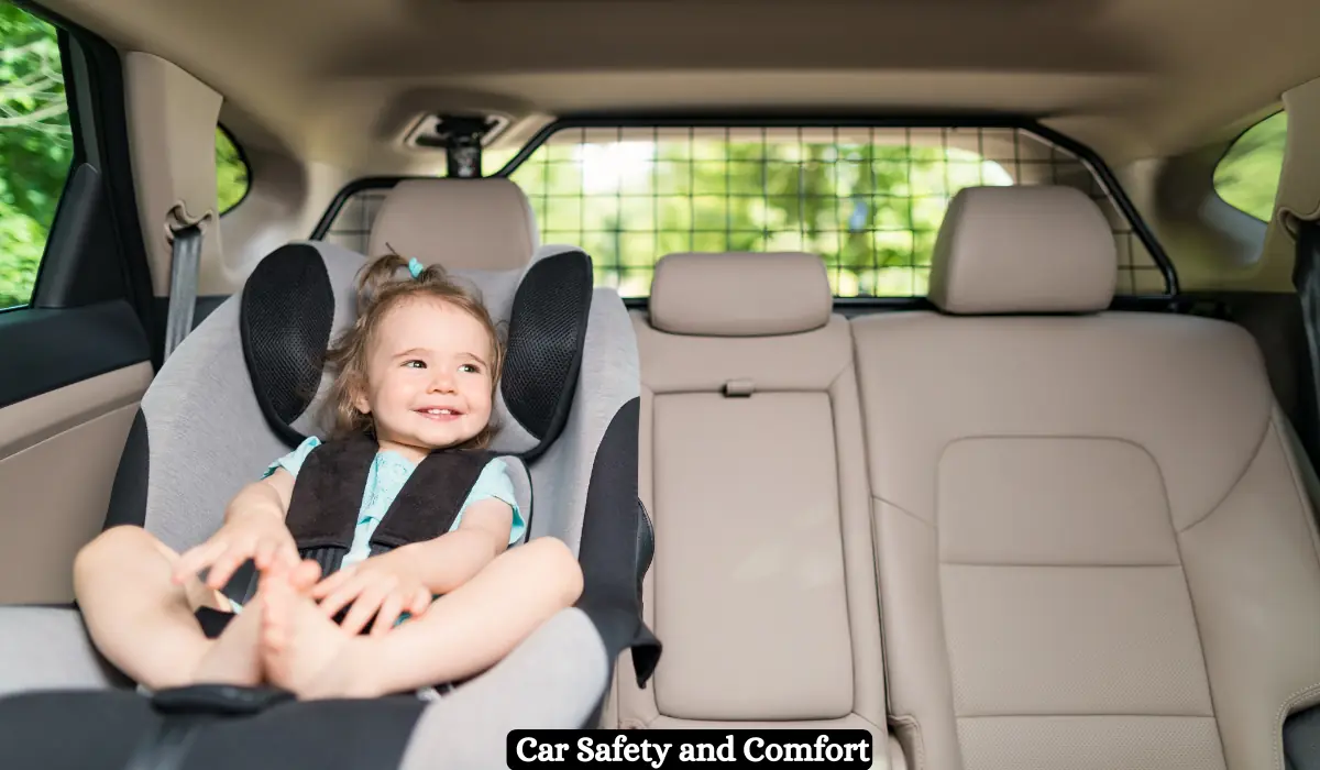 Toddler Travel Essentials for Road Trip in Winter 2025 4 A young child, smiling and secured in a car seat, sits in the backseat of a vehicle. The car seat is facing forward, and the child has a seat belt fastened. The interior of the car is beige, and the rear window reveals a green, leafy background. The words "Car Safety and Comfort" are at the bottom.