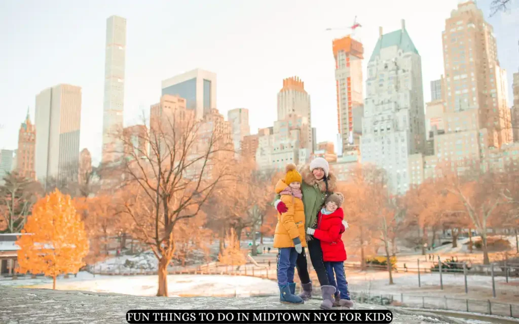 The 12 Best Things to do in Midtown NYC for kids 2 A person with two children stands in a snowy park, bundled in winter clothes. Behind them is a skyline of tall buildings. Text reads, Fun things to do in Midtown NYC for kids.